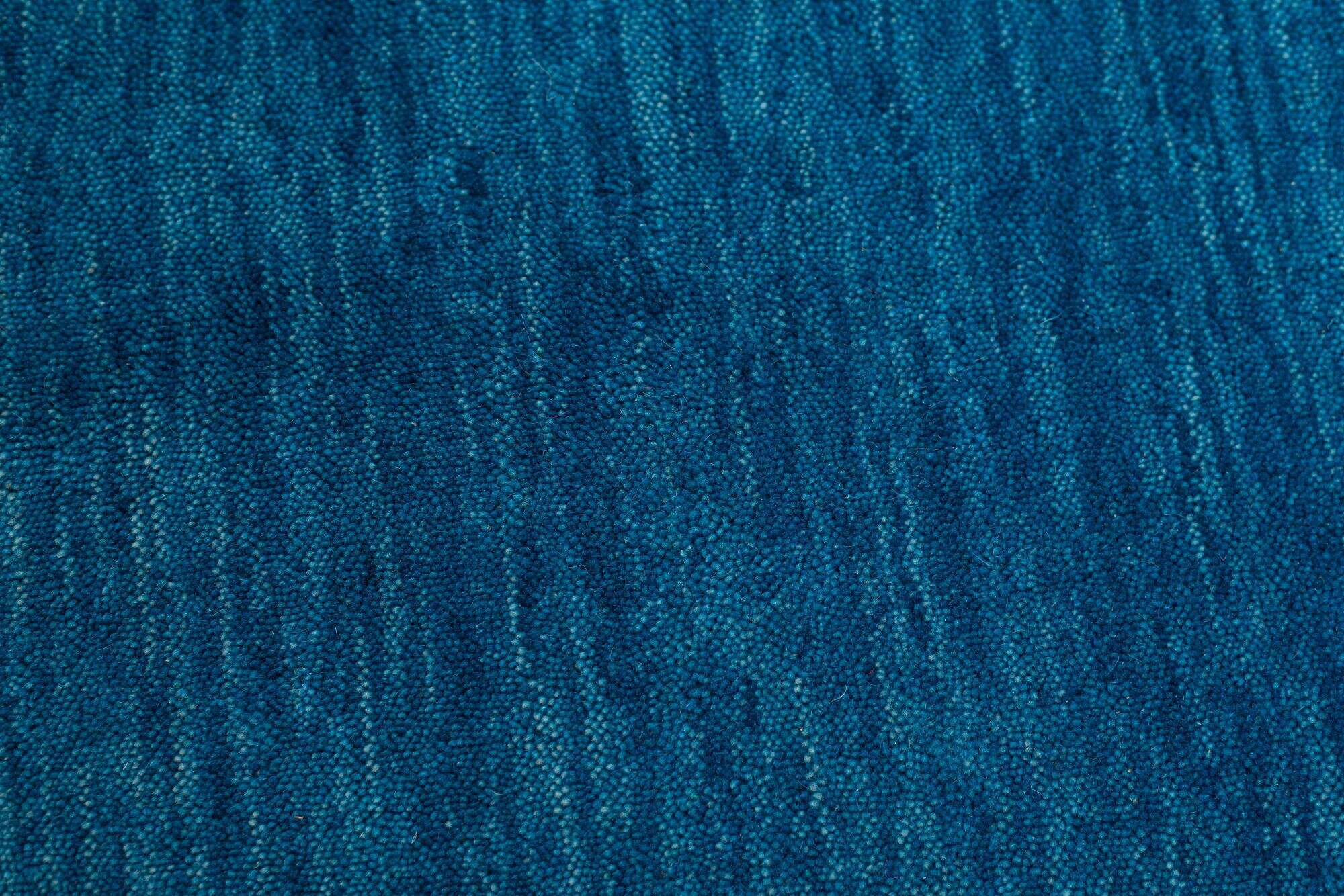 Handwebteppich Holi uni blau im Wunschmaß